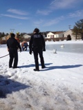 Fire Company melting the ice with a hose
